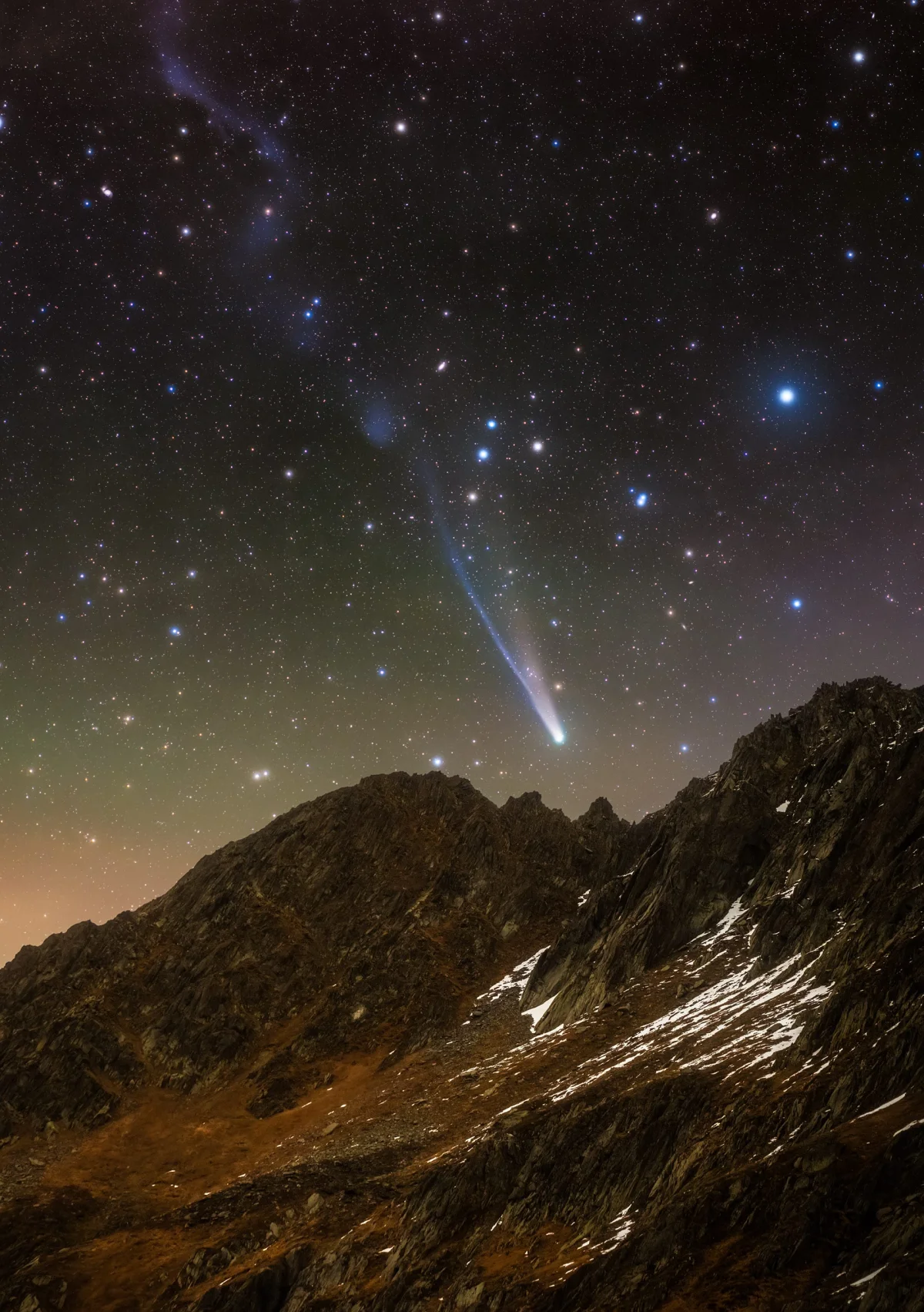 a photo of a comet over the Swiss Alps